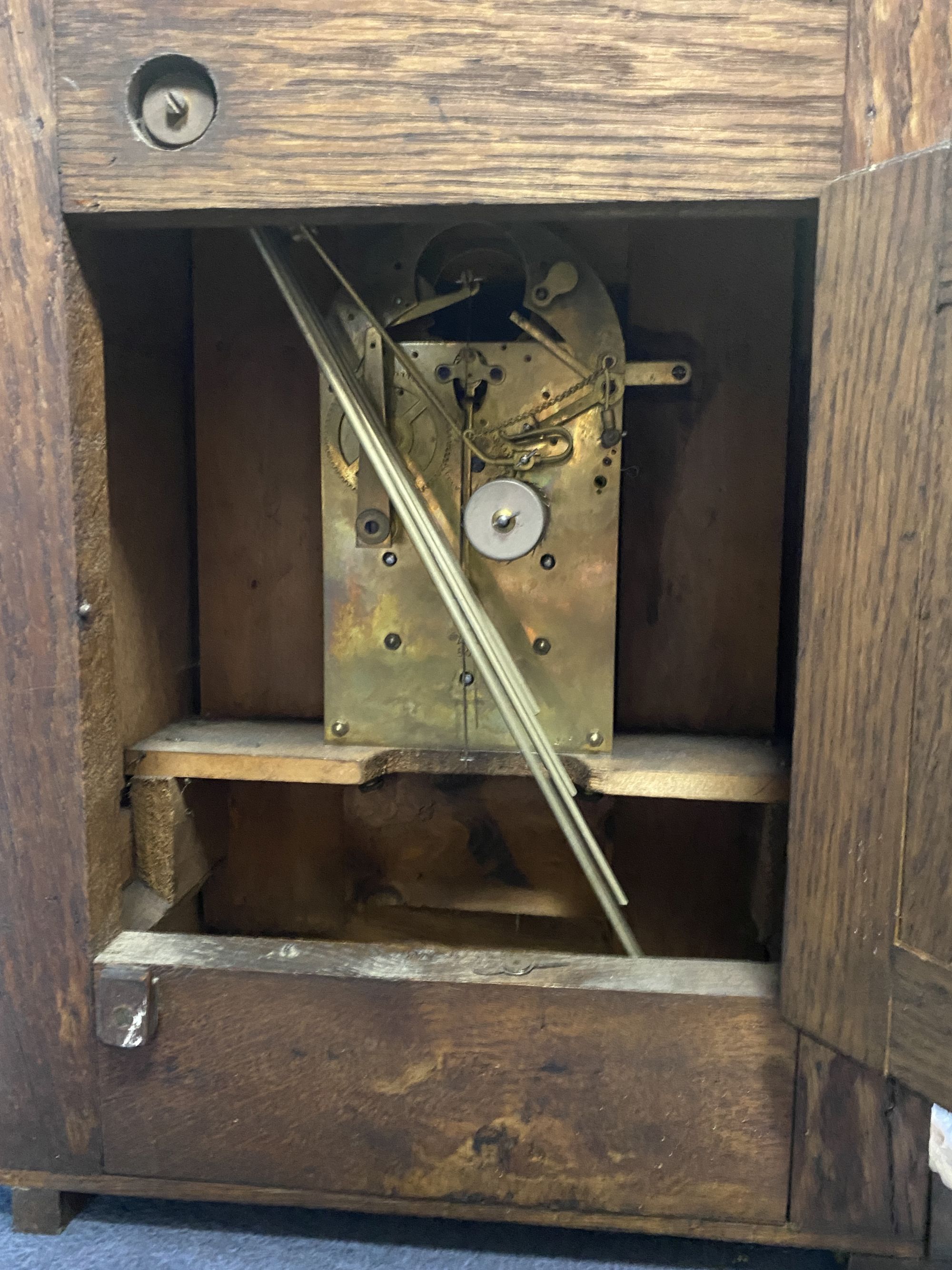 A Victorian oak mantel clock, height 50cm